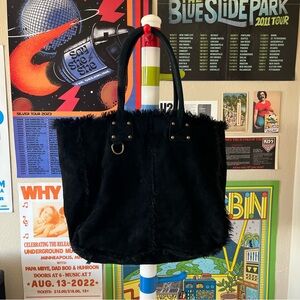Black suede tote bag with fur interior